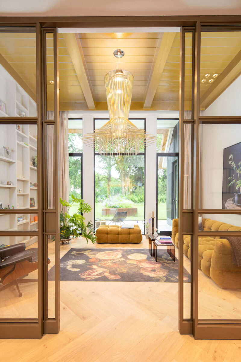 Luxe gezinsvilla ontworpen door EVE Architecten - Zitkamer