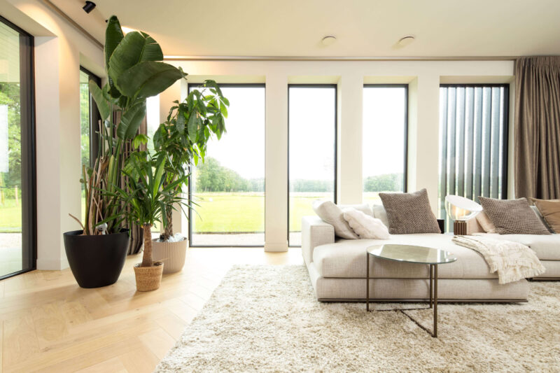 Luxe gezinsvilla ontworpen door EVE Architecten - Woonkamer