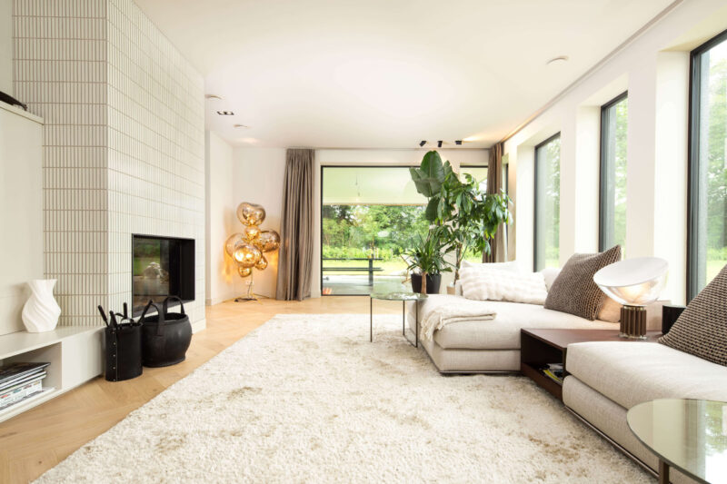 Luxe gezinsvilla ontworpen door EVE Architecten - Woonkamer